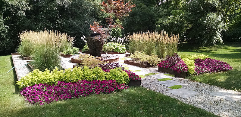 Contemporary Garden Makeover with Unilock Rivenstone & Water Feature